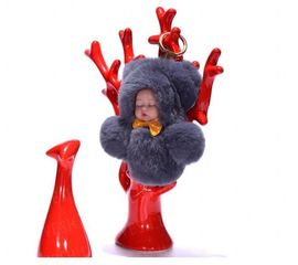 Меховой брелок на сумку. Куколка. 19см. Темно серый., фото 1